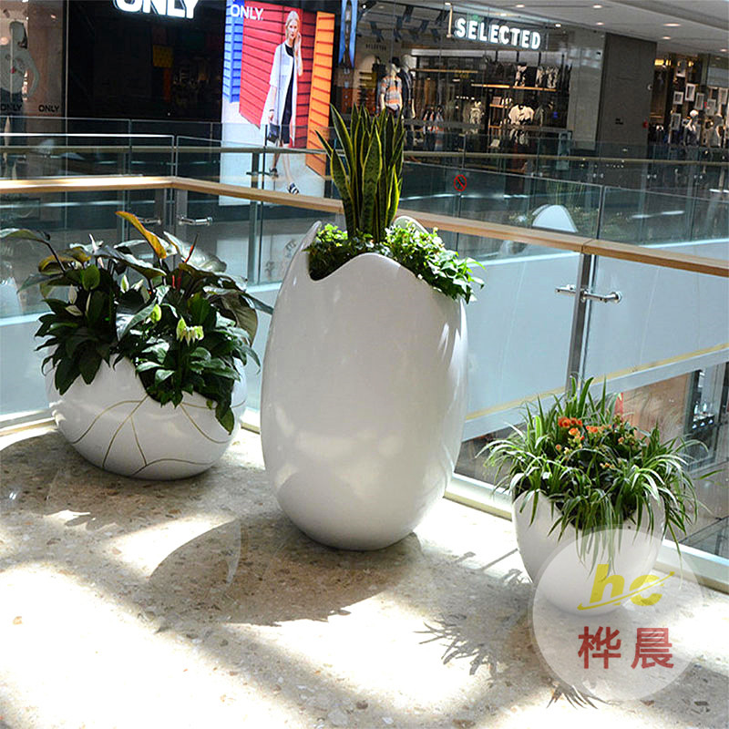 吉林長(zhǎng)春樓盤戶外玻璃鋼藝術(shù)組合花器